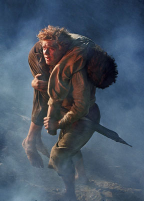 Sam carrega Frodo